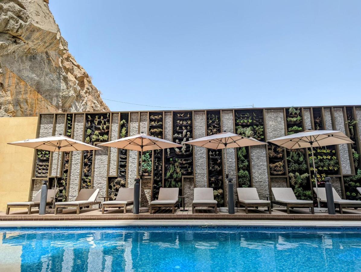 Citadines Abha Aparthotel Exterior photo The pool at the hotel