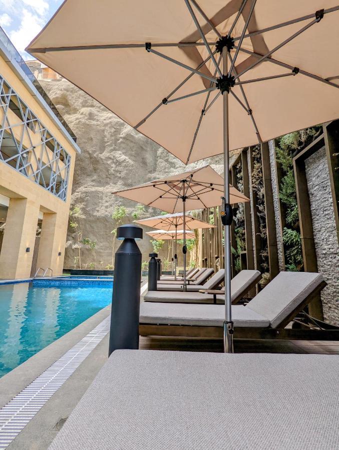 Citadines Abha Aparthotel Exterior photo The pool at the hotel