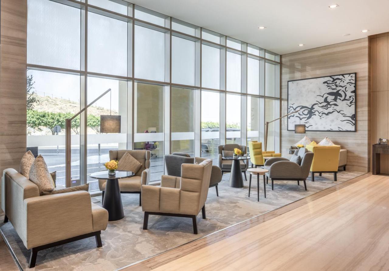 Citadines Abha Aparthotel Exterior photo The Lounge at the airport