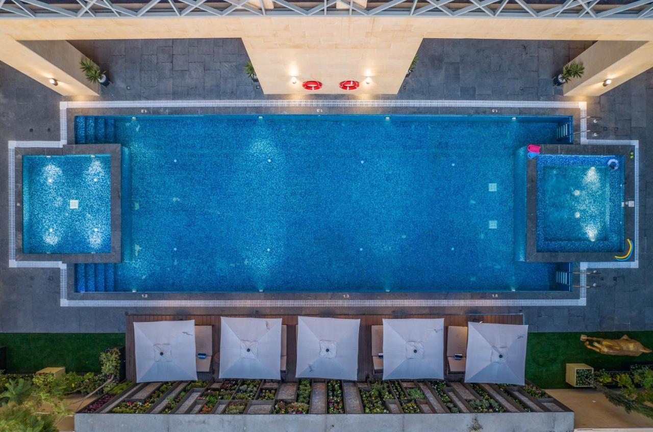 Citadines Abha Aparthotel Exterior photo The swimming pool at the hotel