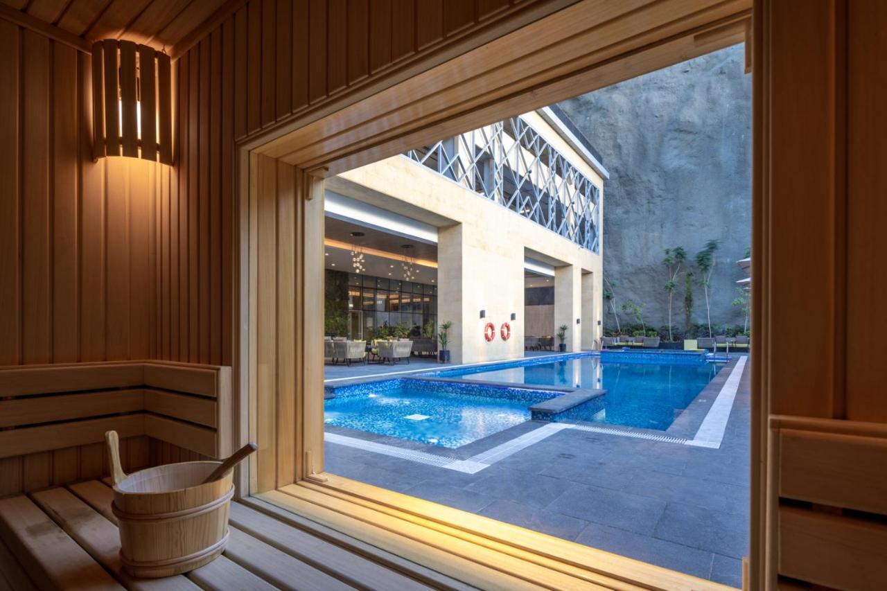 Citadines Abha Aparthotel Exterior photo The swimming pool at the hotel